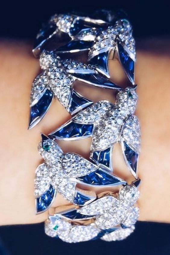 An unforgettable sapphire and diamond bird bracelet by Cartier....