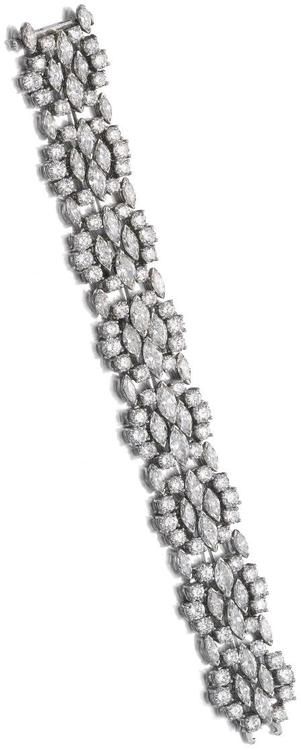 Diamond bracelet, Harry Winston. The flexible band set with marquise-shaped, bri...