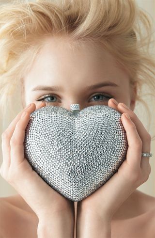 Chanel silver beaded heart bag...