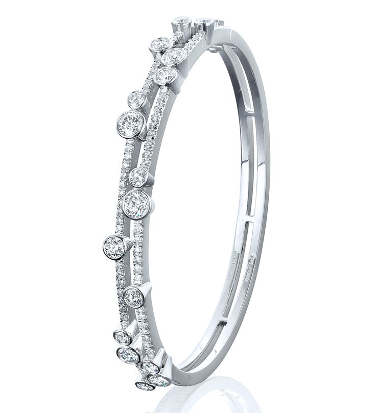 An impressive, elegant bangle from Boodles' Waterfall collection featuring 3...