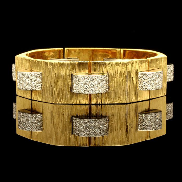 Cartier.circa 1970.A stylish textured yellow gold bracelet with pyramid panels i...