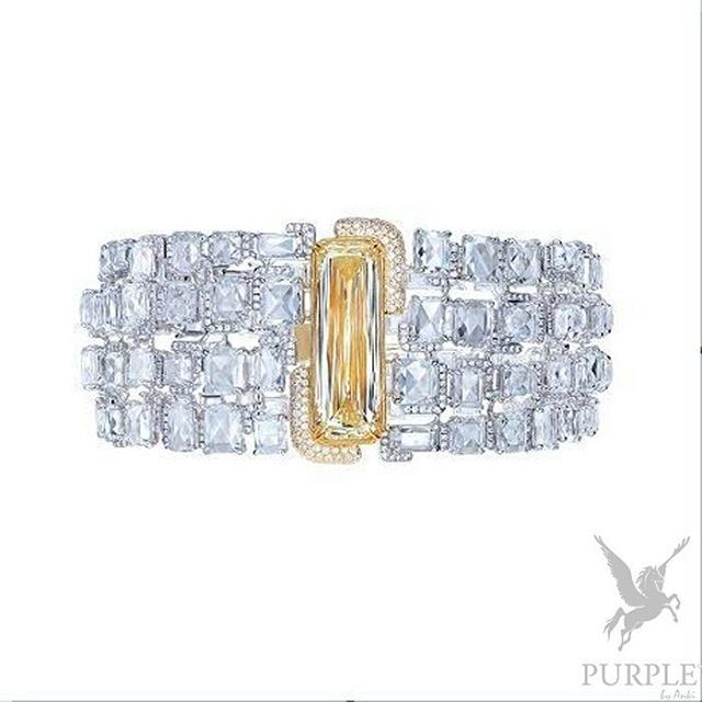 Check these elegantly and unique fancy yellow diamond and diamond square bangle ...