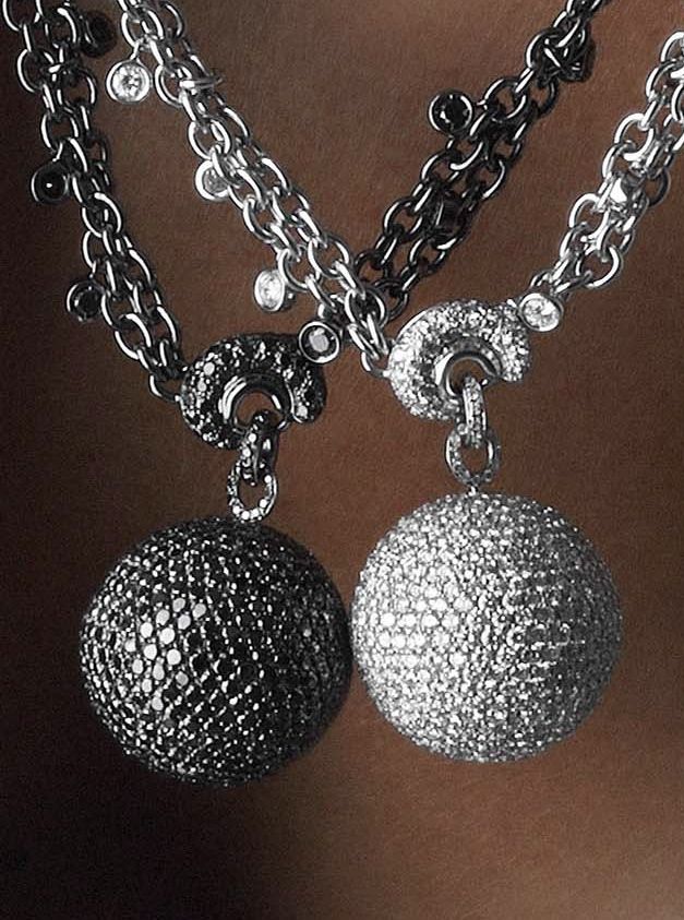 de GRISOGONO black diamond and white diamond boule necklaces...