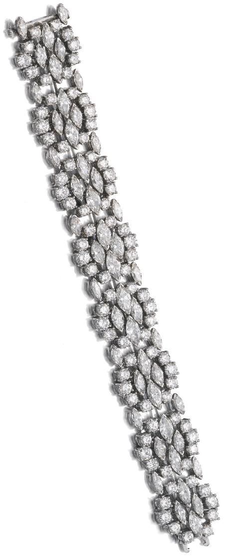 Diamond bracelet, Harry Winston The flexible band set with marquise-shaped, bril...