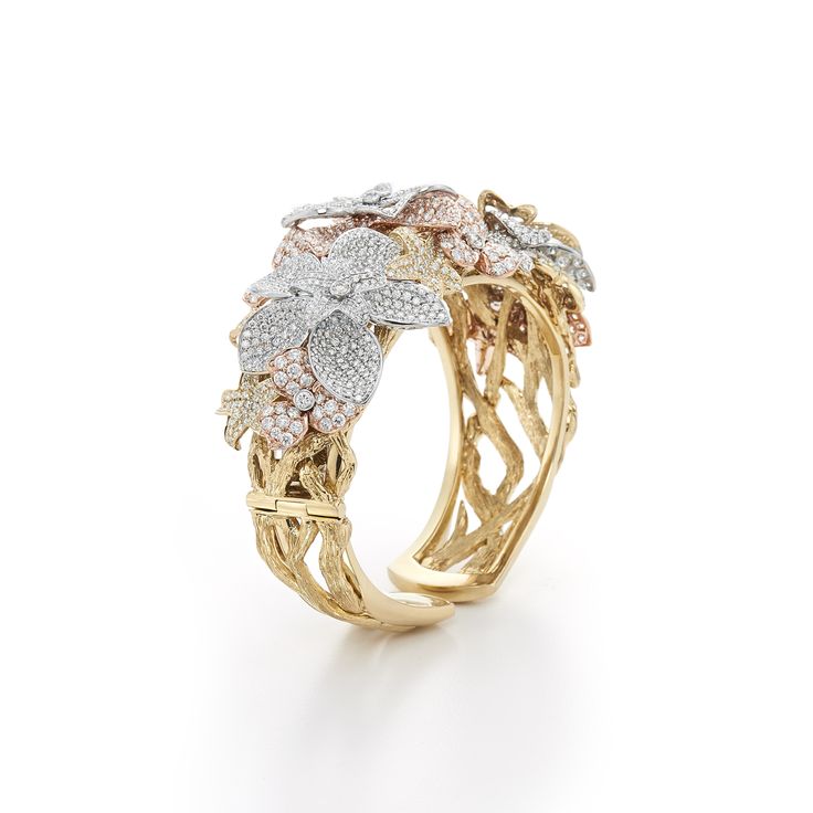 Diamond cuff in 18k yellow, white and rose gold. Lotus Diamond Bracelet by Kwiat...