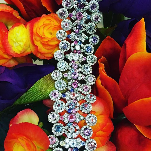 Diamonds and sapphires in bloom: this elegant coloured sapphire and diamond brac...