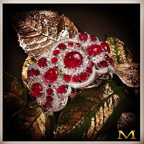Festive Spirit! A magnificent Moussaieff bangle with the most beautiful Cabochon...