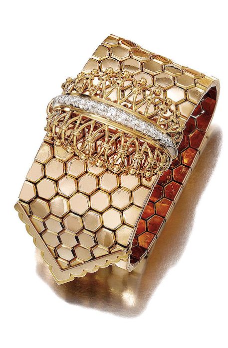 GOLD AND DIAMOND BRACELET, CIRCA 1940 composed of a flexible ribbon gold hexagon...