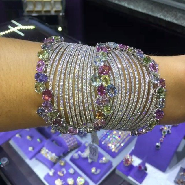 Multi color Sapphire and diamond cuff.. Elegantly executed #petermarcobeverlyhil...