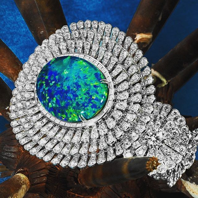 ORLOV on Instagram: “#orlovjewelry A bloom opens and petals sway in the breeze - A natural Australian Black Opal center displays a varied flash pattern with…”