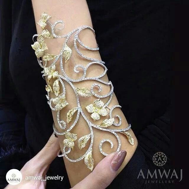 repost from @amwaj_jewelry Exquisite , white and yellow bangle , shown at the In...