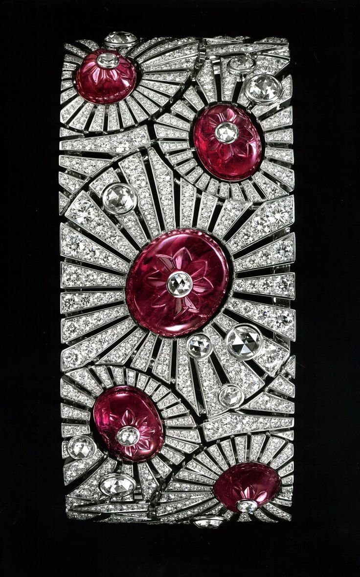 Cartier. Carved ruby and diamond art deco bracelet....