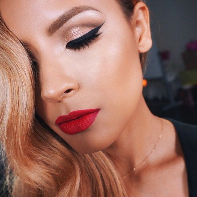 Black liner and red lips are staples for a classic, glam look....