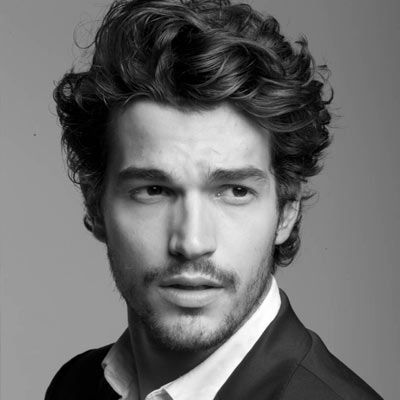 Naturally Curly Medium Hairstyle for Guys