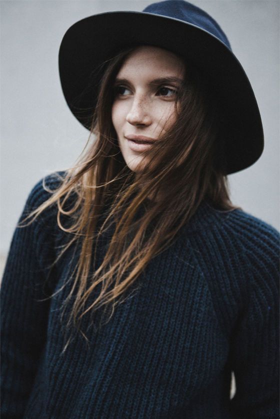 Hat love. Dark grey sweater, long hair and a black hat. Winter stylish look. To ...