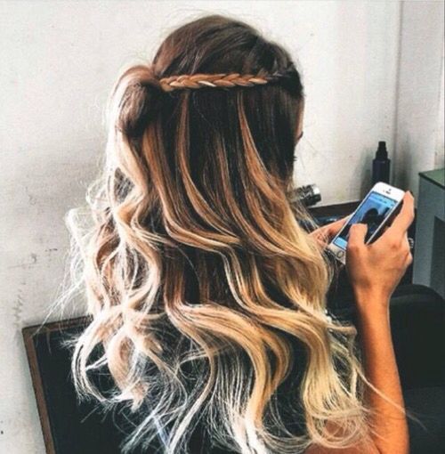 Long hair with waves and a little braid. Inspiration for hairdos.