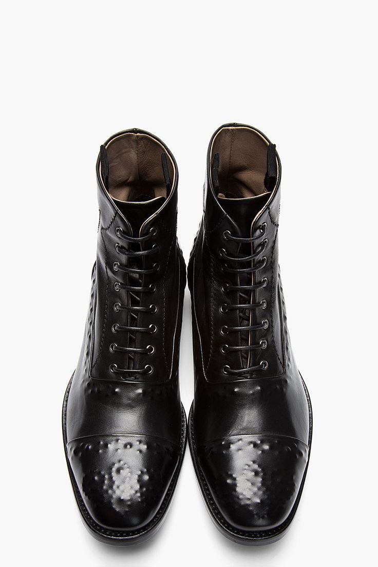 ALEXANDER MCQUEEN   Black leather covered stud boots...
