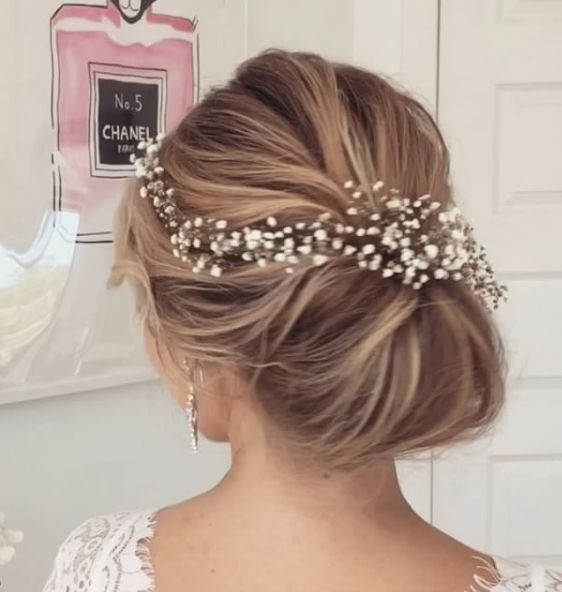 Low Bun White Hairpiece Wedding Hairstyle - MODwedding