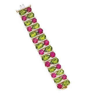 An 18 karat gold, peridot, rubellite and diamond bracelet by Aletto Brothers....
