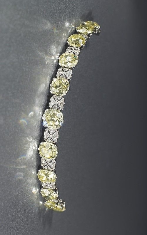 AN EARLY 20TH CENTURY DIAMOND BANDEAU TIARA / BRACELET Christie's