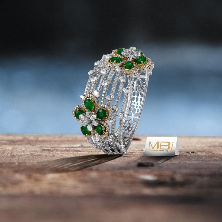 Diamond bracelet with Emeralds. #MBj #Luxury #Desirable #Modern #JewelleryLove #...