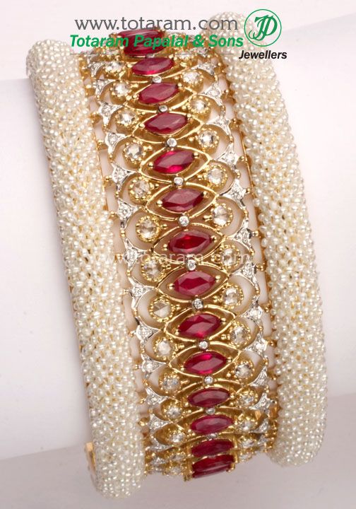gold and diamond bracelet with rubies and pearls...