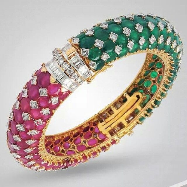 Gorgeous bracelet studded with rubies, emeralds and diamonds...