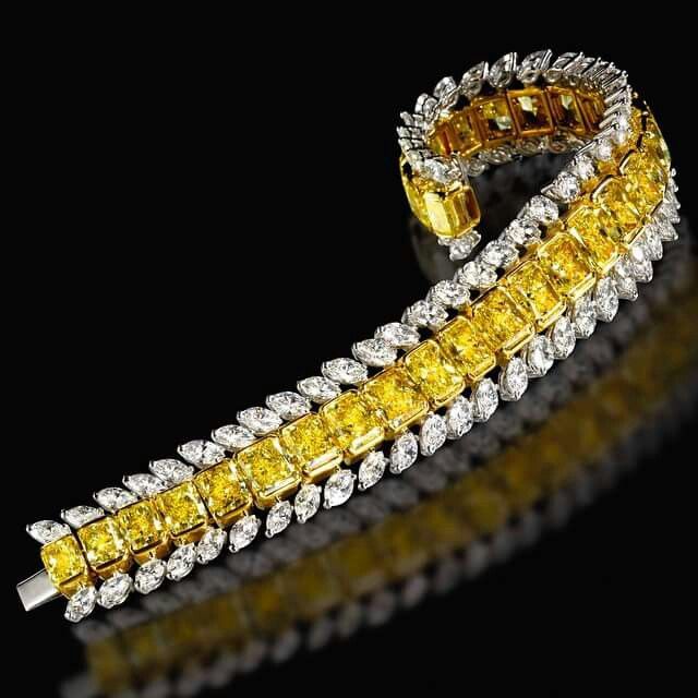 Outstanding 52.57 carat Fancy Yellow and White Diamond Bracelet by #ronaldabram ...