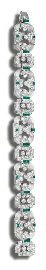 ROCK CRYSTAL, DIAMOND AND EMERALD BRACELET, CIRCA 1925. The octagonal frosted cr...