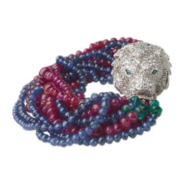 Van Cleef & Arpels | A Ruby, Sapphire bead and Diamond Lion's Head Bracelet,...