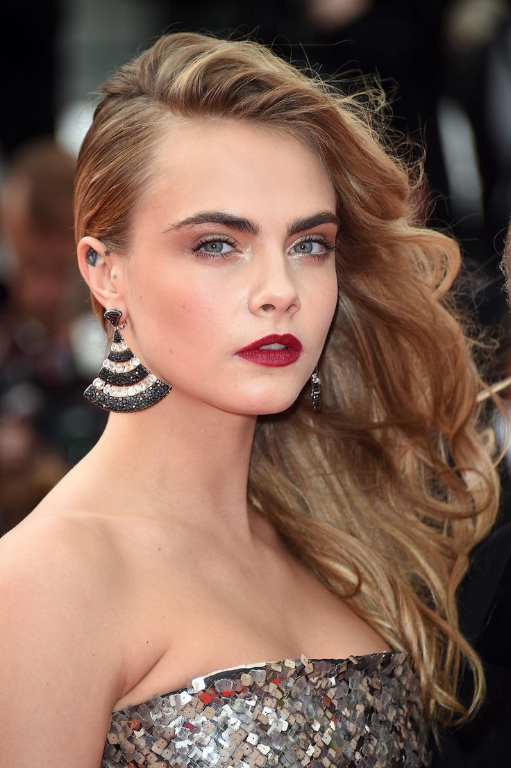 At the Search premiere at Cannes, Cara Delevingne's hair was swept to one si...