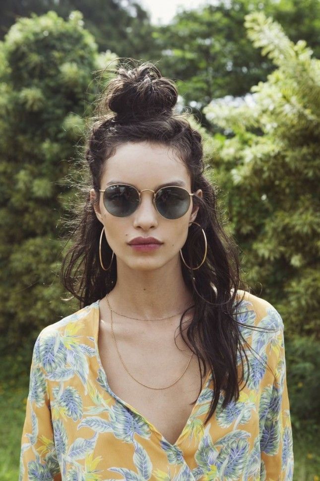 Style your hair into an easy half-up top knot.