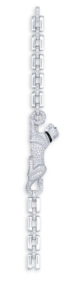 A DIAMOND, EMERALD AND ONYX PANTHERE BRACELET, BY CARTIER The front designed as ...