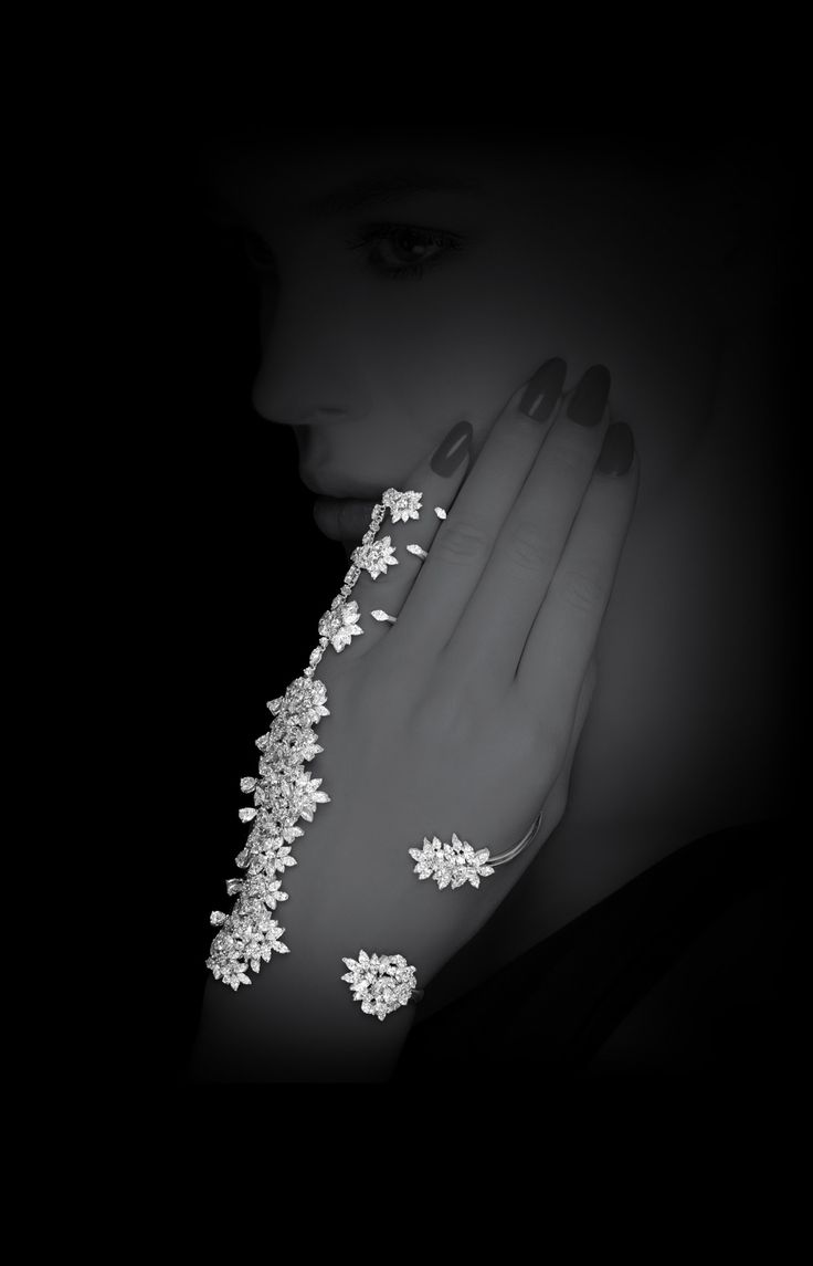 A whole new way to look at white diamonds. The diamonds are cut in a way that tr...