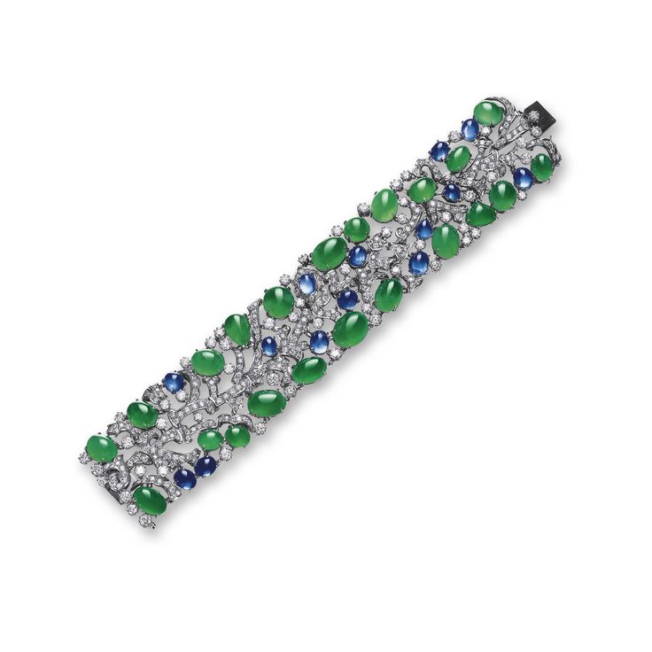 ADEITE, SAPPHIRE AND DIAMOND BRACELET The supple bracelet composed of a cluster ...