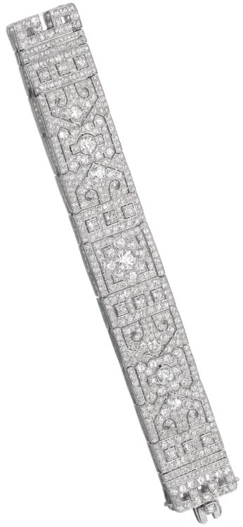 Art Deco diamond bracelet, circa 1930. Of highly articulated open work geometric...