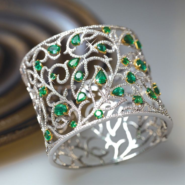 Bespoke emerald bangle from Gemoro Jewellery of Dubai. www.gemorojewelle......