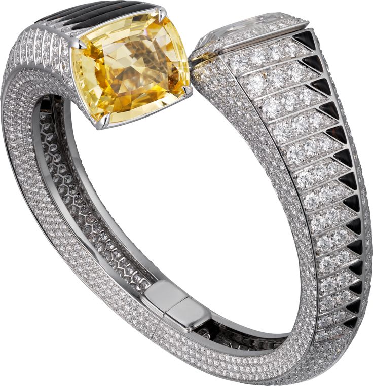 CARTIER. High Jewellery visible hour watch, one 19.20-carat cushion-shaped yello...
