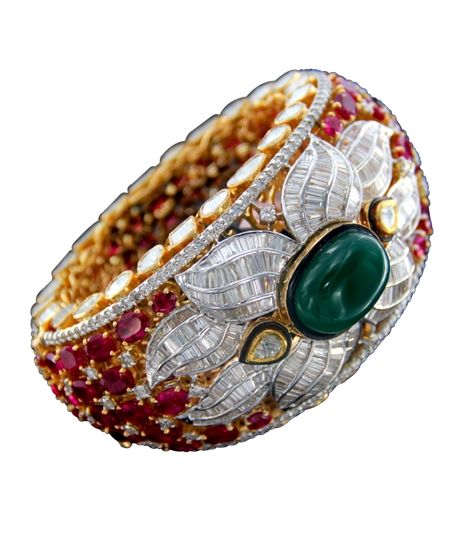 Emeralds, grroved rubies, kundan stones, South sea pearls in 22K gold cuff...
