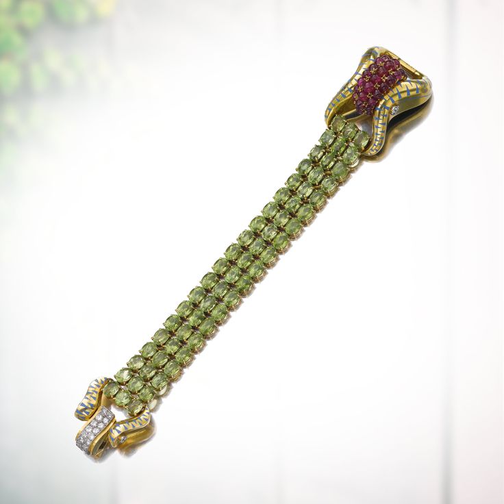 Gem set, enamel and diamond bracelet, Lacloche, 1955 - oval peridots, cabochon r...