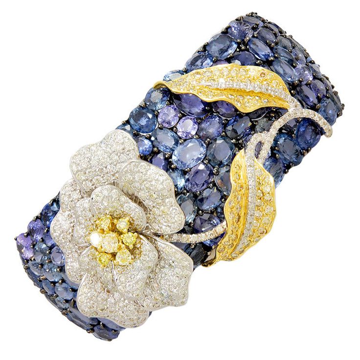 Magnificent Sapphire and Diamond Flower Cuff with !26.50 Carats of Blue Sapphire...