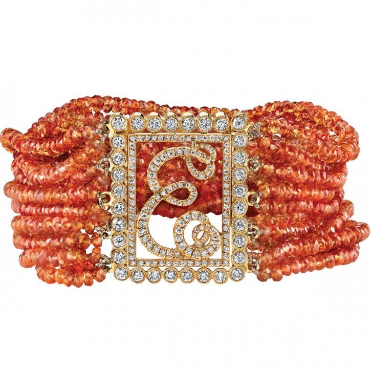 Mandarin garnet and diamond bracelet by Erica Courtney...