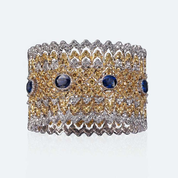Viscontessa Bracelet The eight oval-cut sapphires are silent drops in a sea of y...