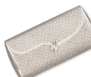AN 18K WHITE GOLD AND DIAMOND EVENING BAG...