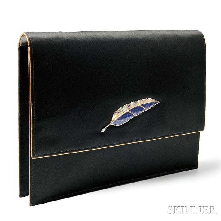 Black Silk Evening Bag, Cartier, the clasp designed as a gold leaf set with lapi...