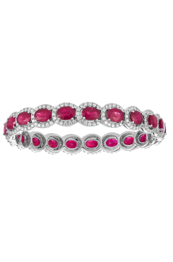 Be bold and vivacious in Haute Vault's 18K white gold bracelet, decked out i...