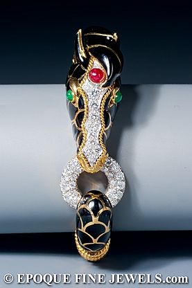 David Webb - A beautiful black enamel, ruby, emerald and diamond horse bracelet,