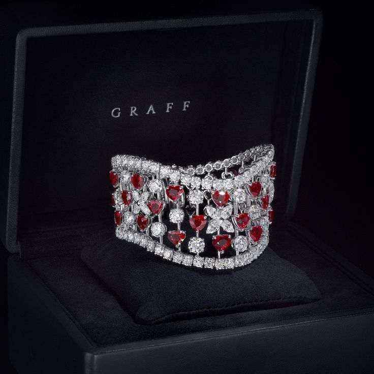 Fall in love with #GraffDiamonds unique ruby and diamond bracelet, featuring ove...