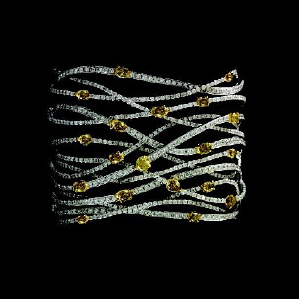 Piranesipreciousjewels Intricated woven diamond cuff with fabulous yellow diamon...