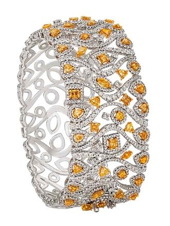 Yellow diamond bangle by Bapalal Keshavlal
